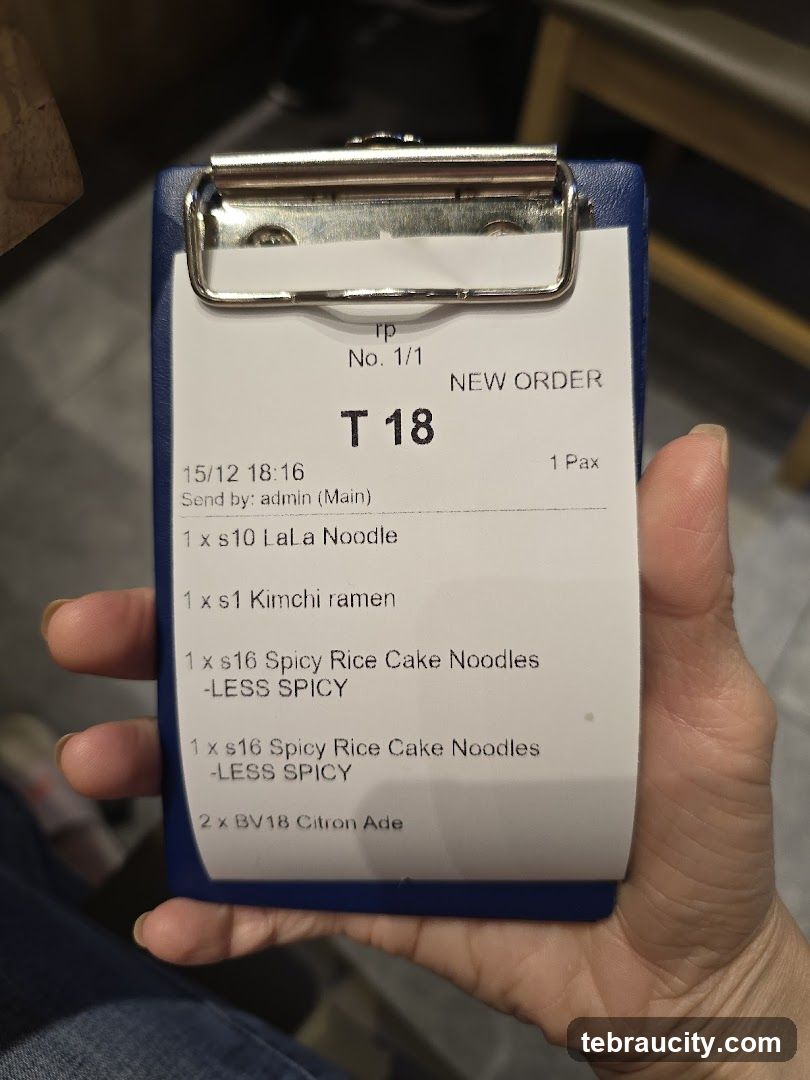 Hand holding order pad