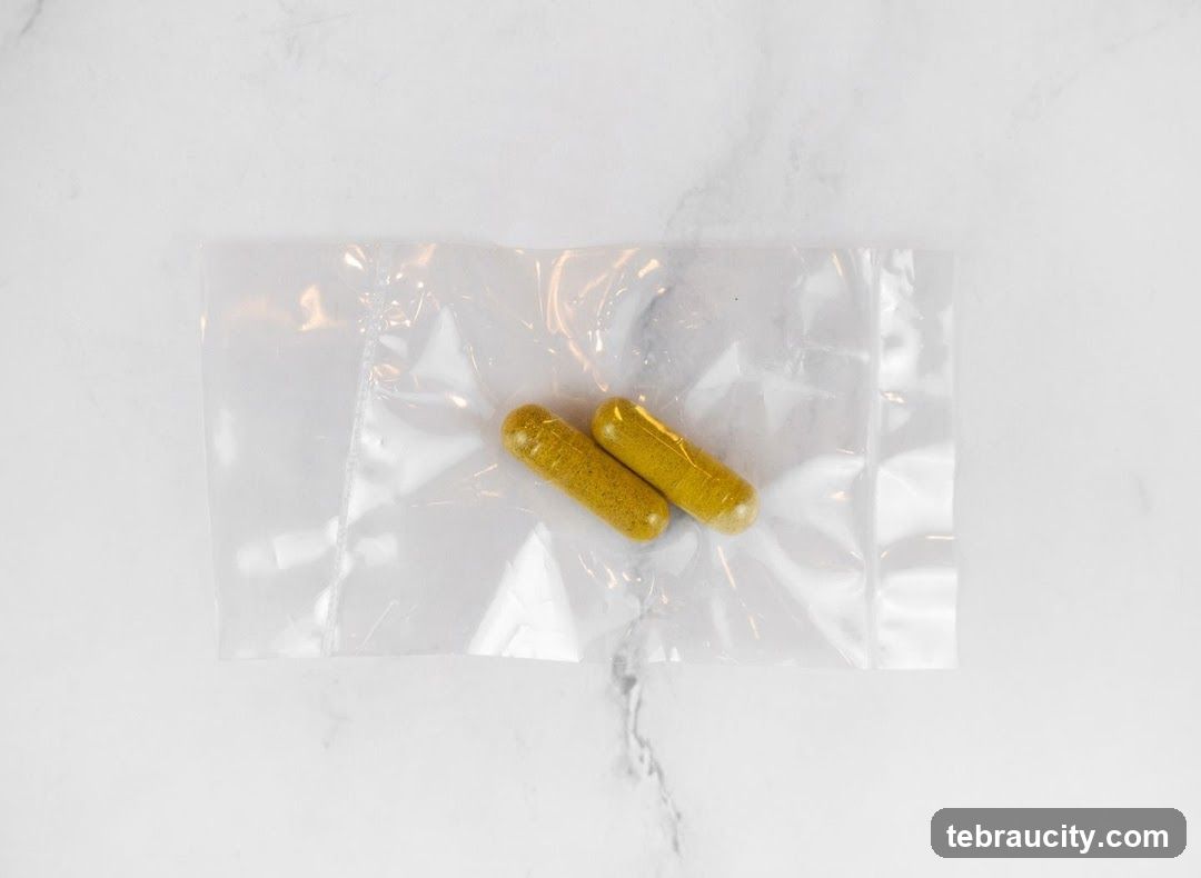 Two yellow capsules in a plastic bag