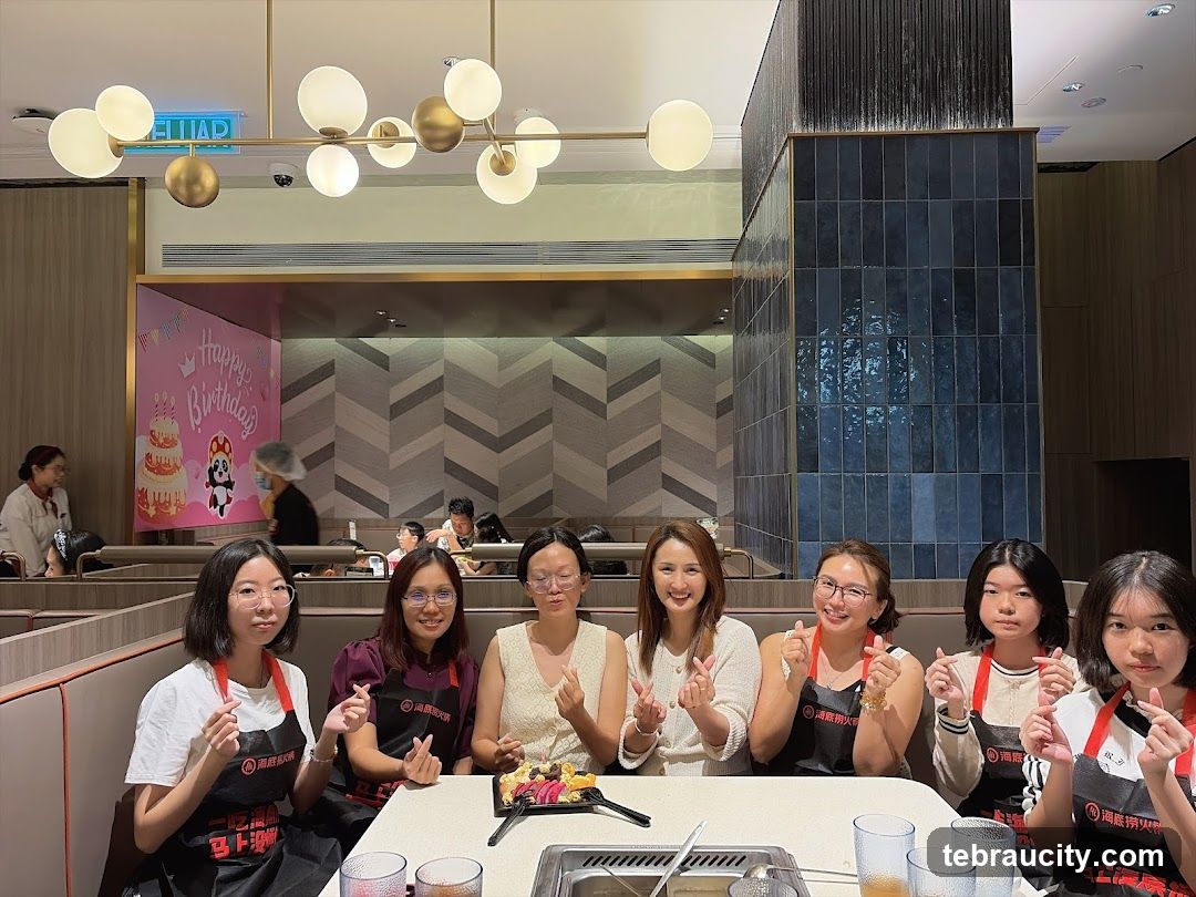 Group celebrating birthday at a restaurant