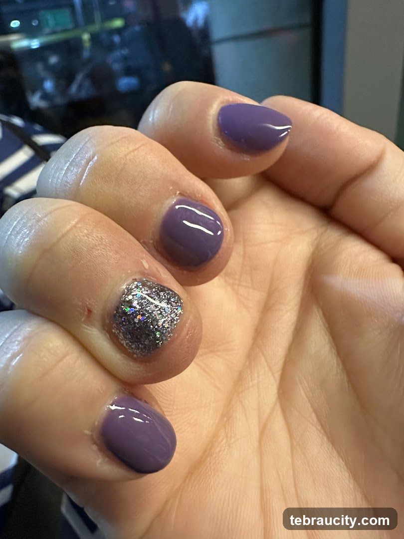 Purple Nails with Glitter Accent