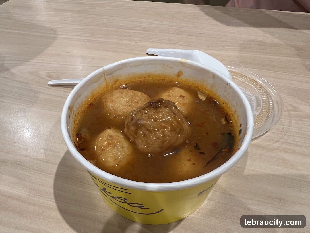 Bowl of Soup with Meatballs