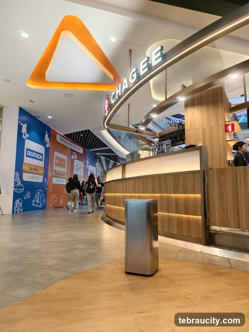 Indoor shopping mall area with a cafe