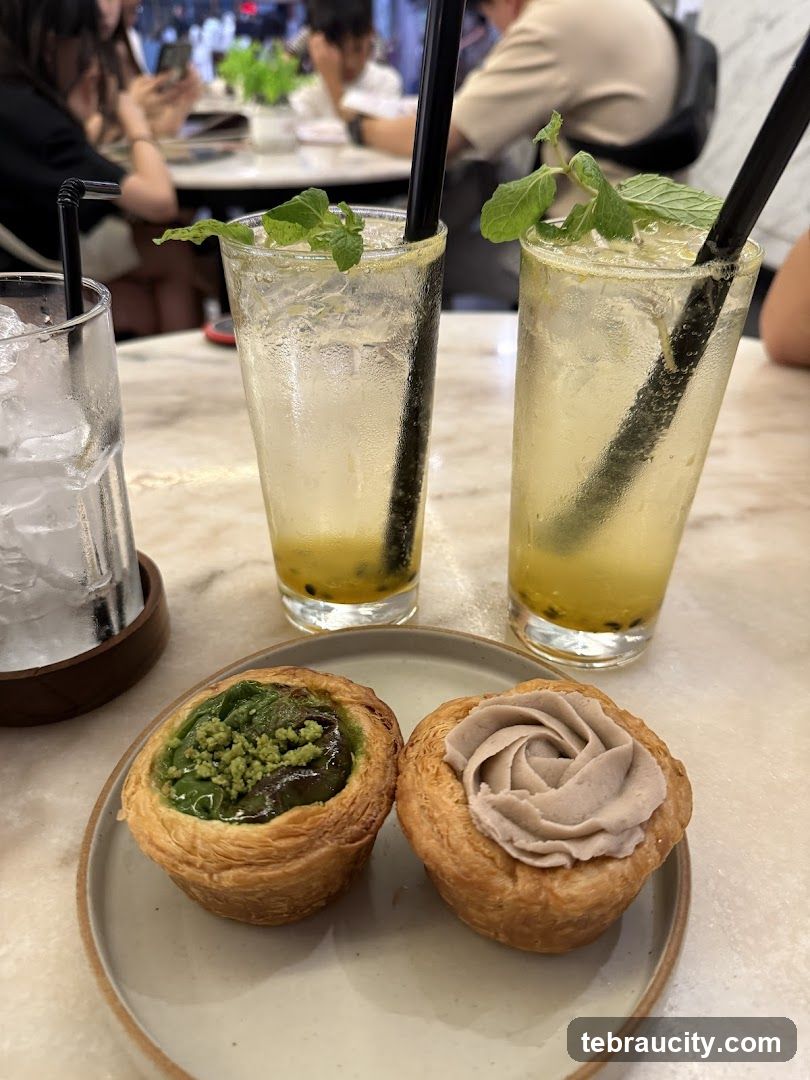 Two pastries and two drinks on a table