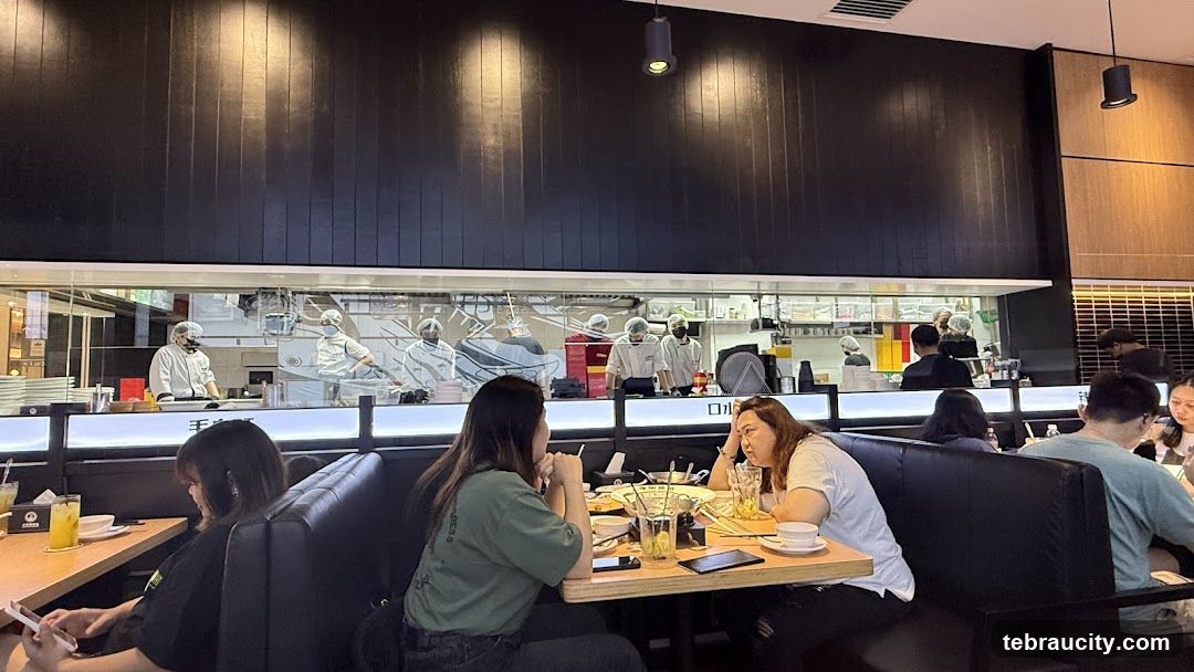 Diners in a Restaurant with Open Kitchen
