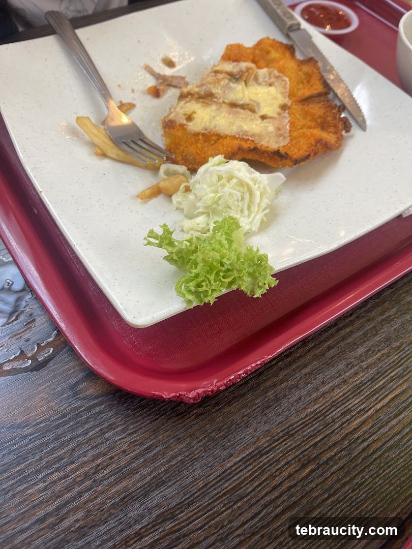 Half-eaten meal on a tray