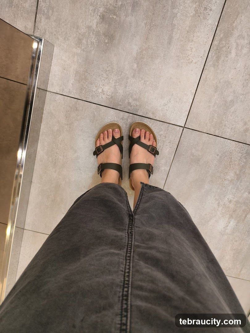 Feet in Sandals and Skirt