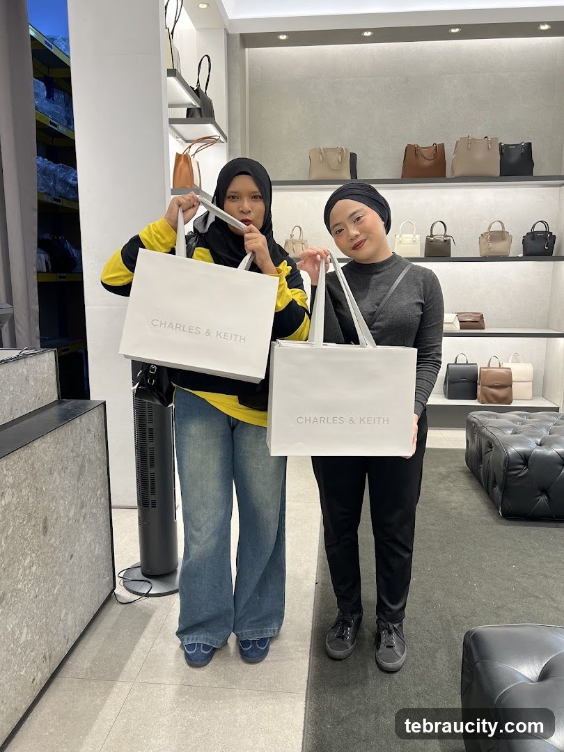 Two Women Holding Shopping Bags