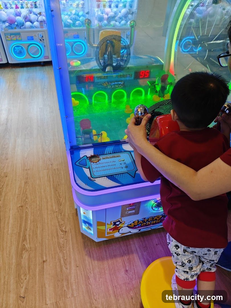 Children playing arcade game