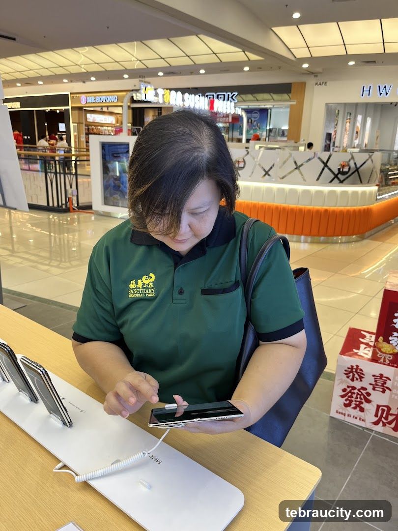 Woman using a smartphone in a mall