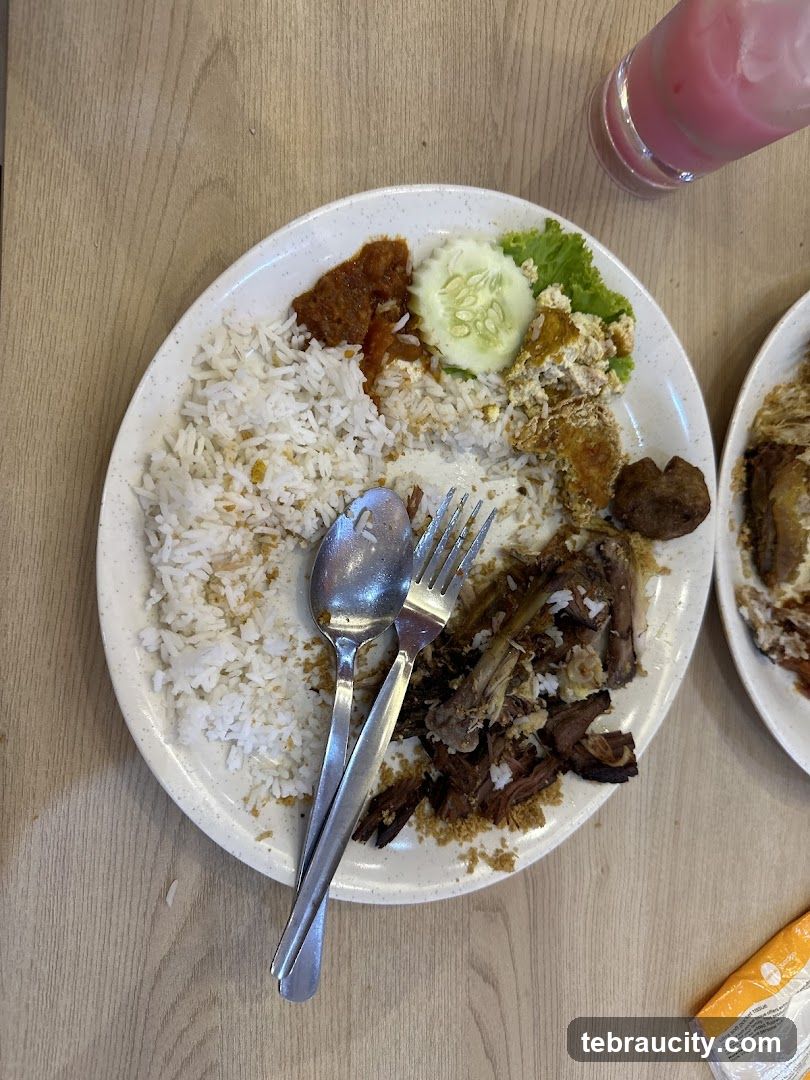 Plate of food with rice and meat