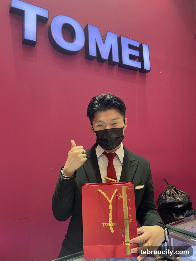 Jewelry Store Employee with Shopping Bag