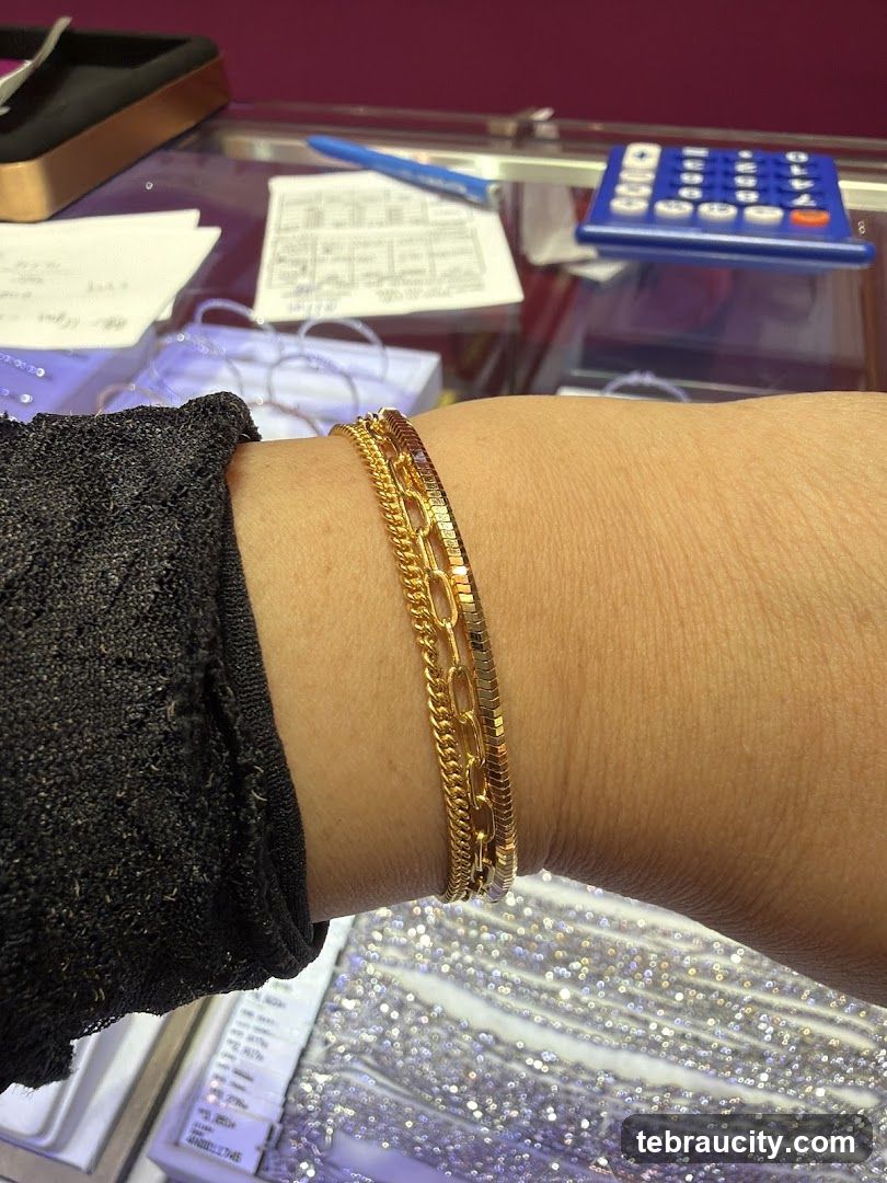Gold Bracelets on Wrist