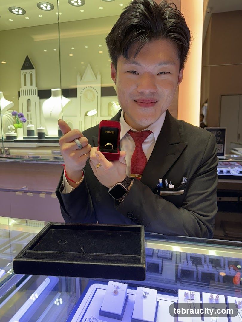 Jewelry Store Employee Showing a Ring
