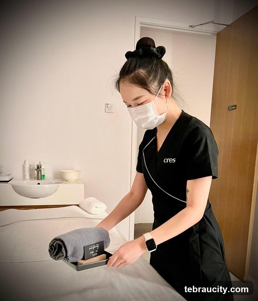 Spa worker preparing a treatment room