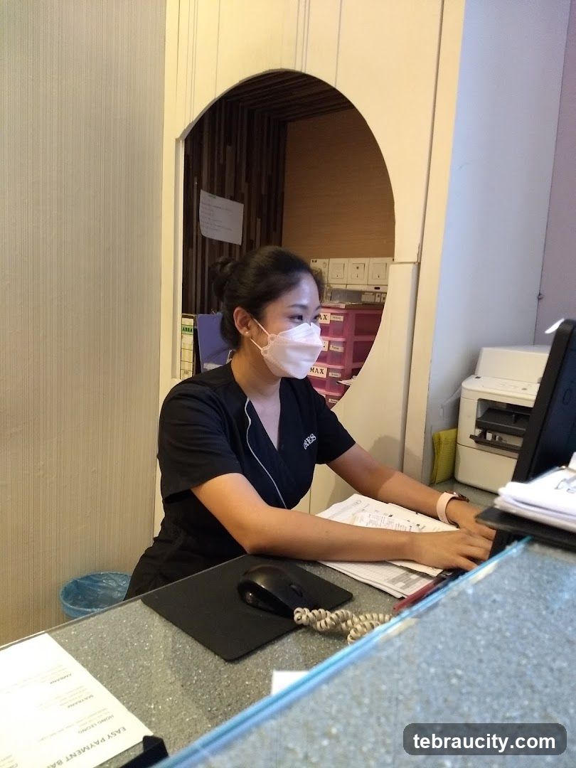 Receptionist at Desk