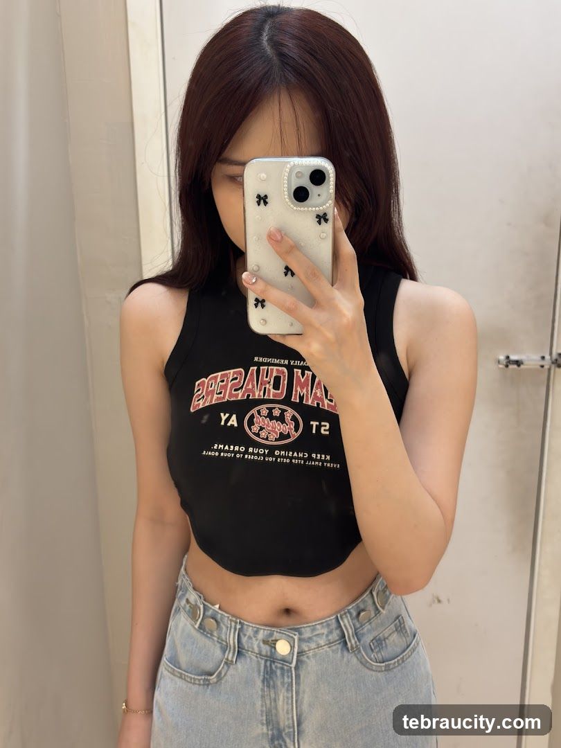 Woman Taking a Mirror Selfie