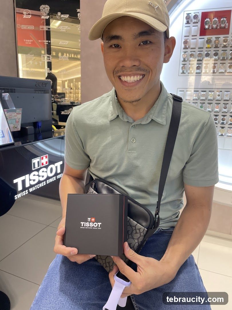 Man Holding Tissot Watch Box