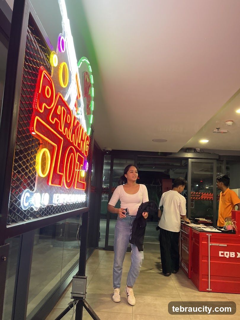 Neon Sign and People at a Counter