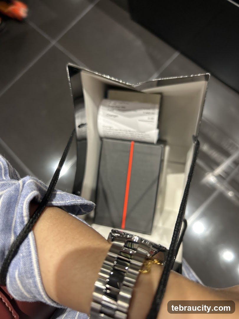 Shopping Bag with Receipt and Watch