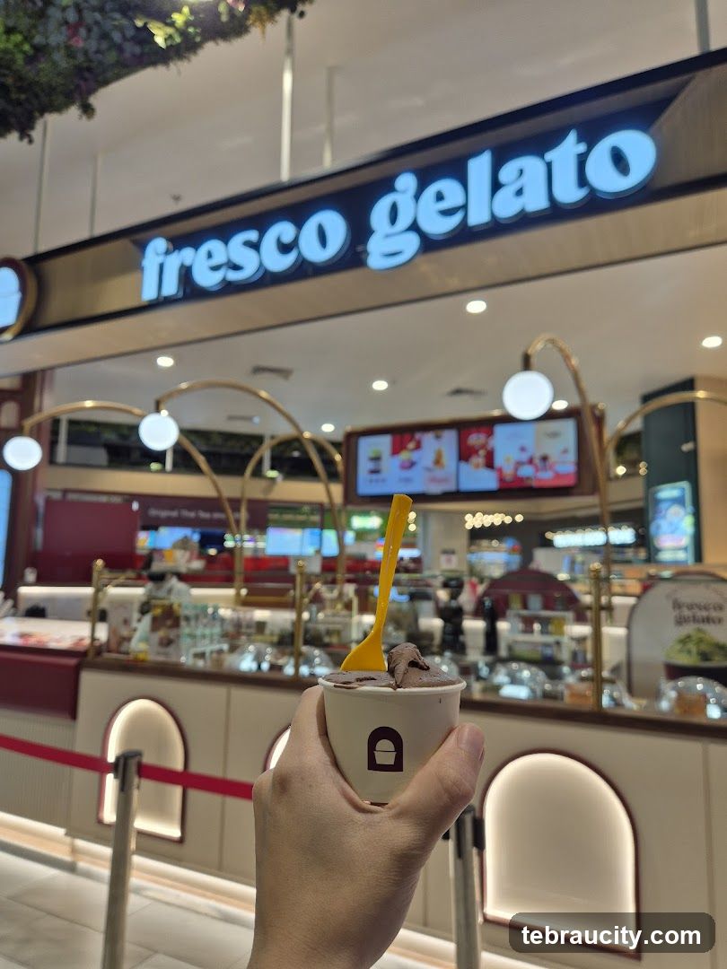Gelato cup with a spoon