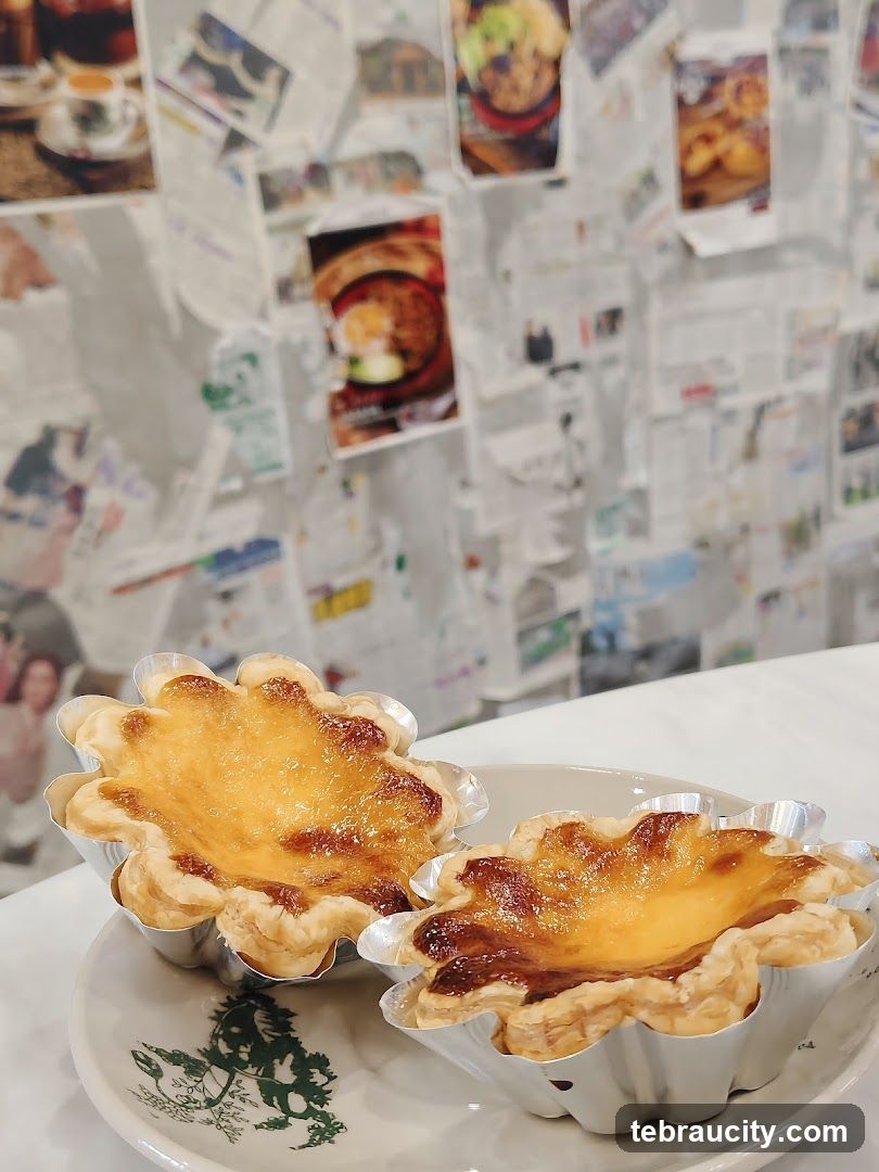Two Egg Tarts on a Plate