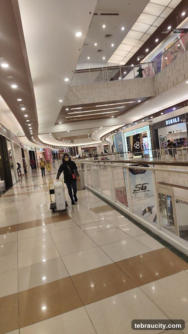 Mall interior with shoppers
