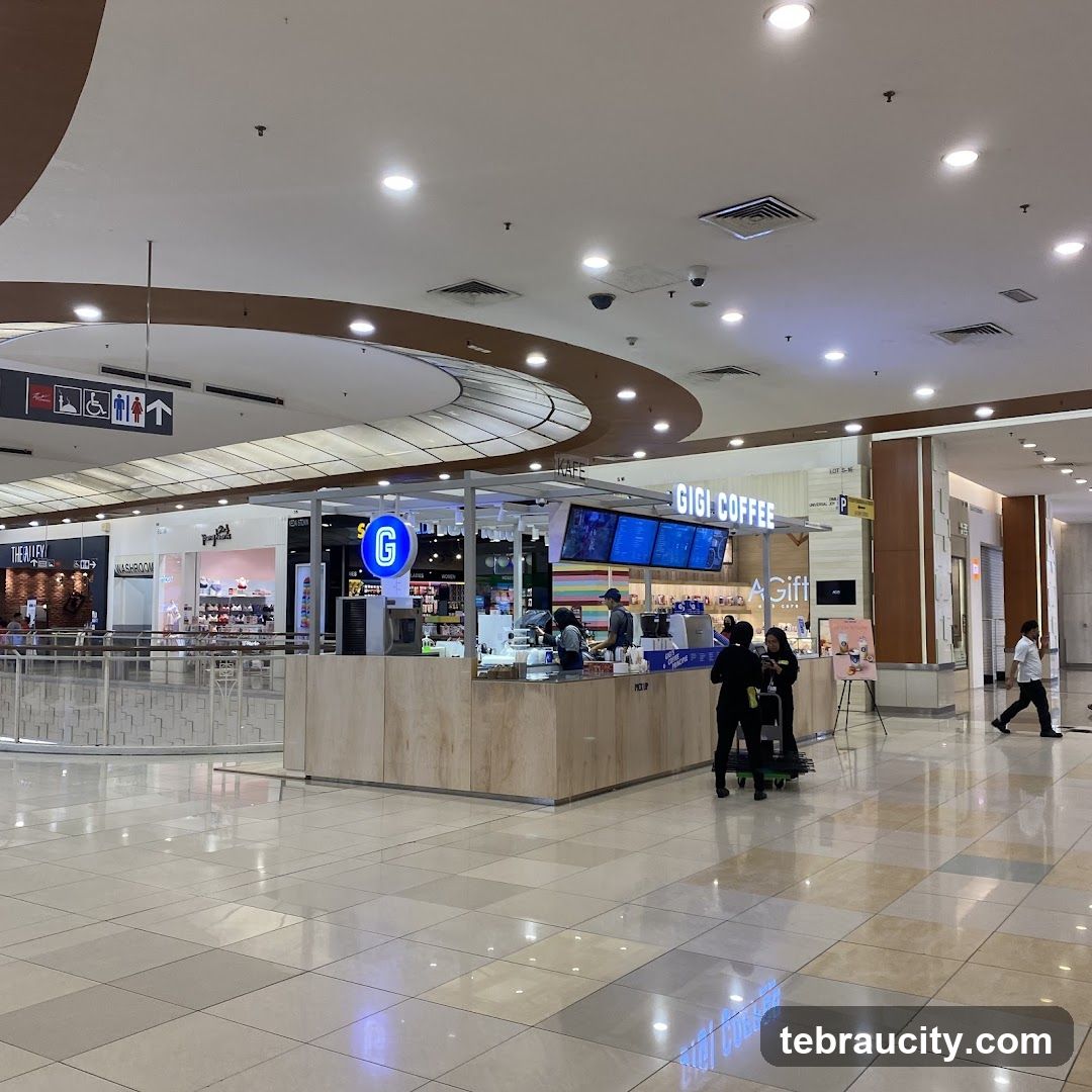 Interior of shopping mall with GIGI COFFEE kiosk