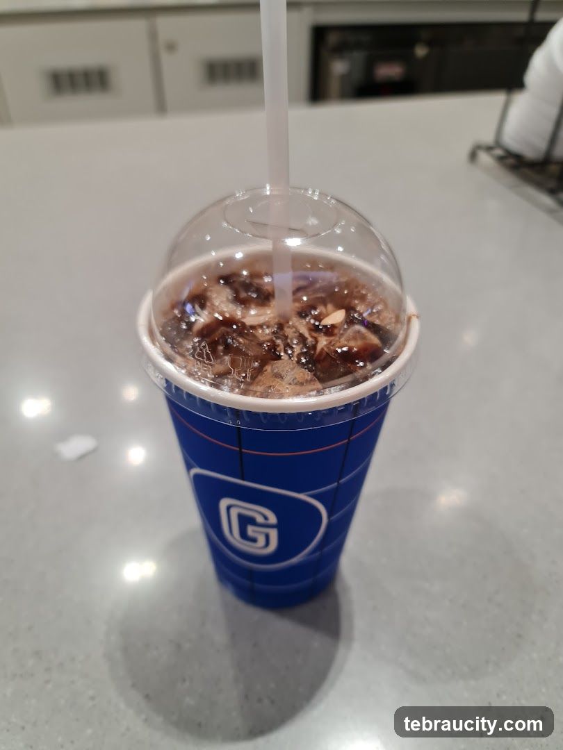 Iced beverage in branded cup