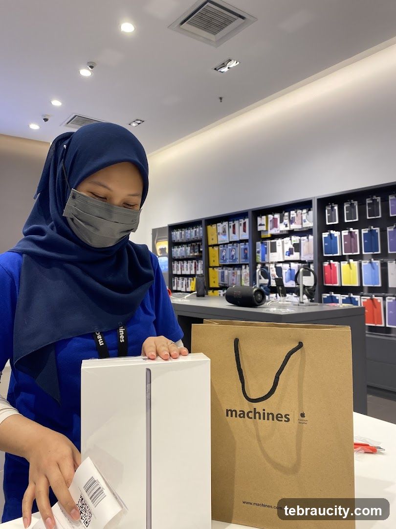 Salesperson with Apple Product