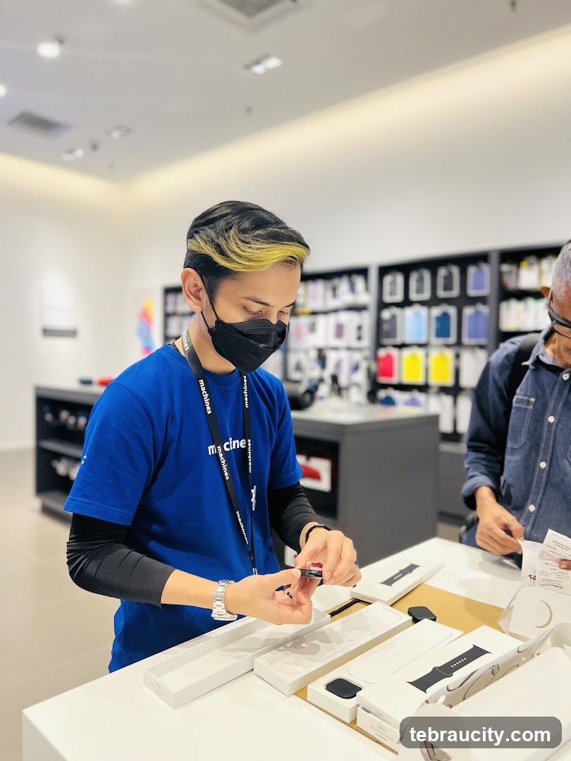 Salesperson assisting customer with accessories