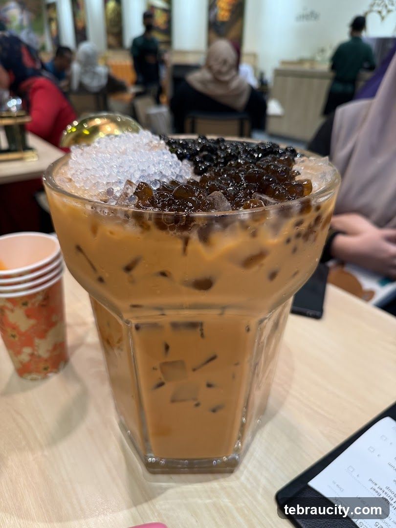 Iced beverage with toppings