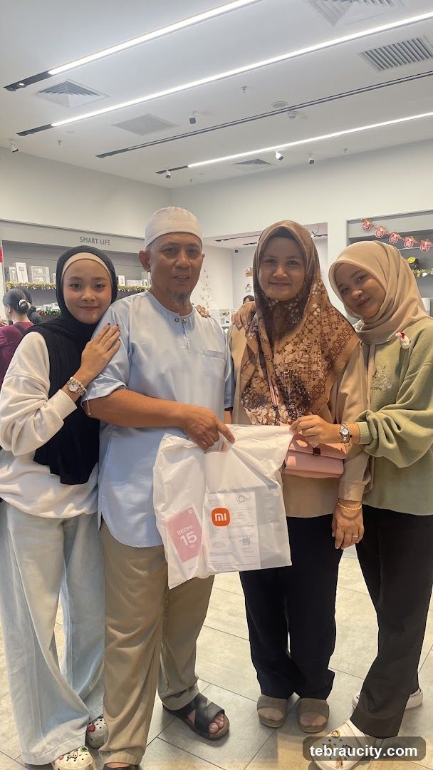Family Posing with Shopping Bags