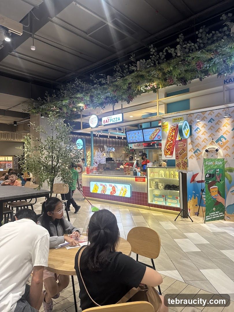 Food court eatery with pizza and fish and chips