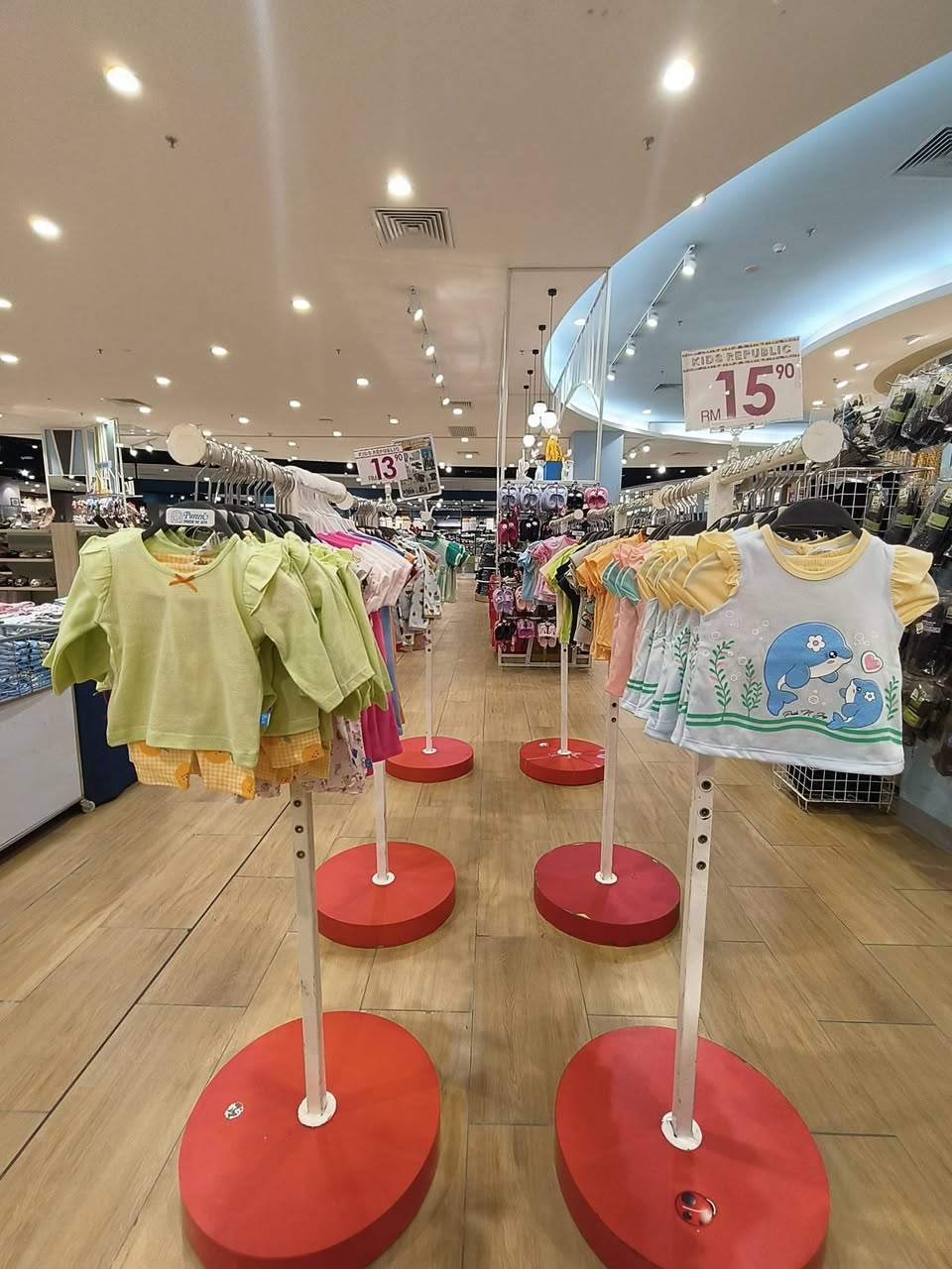 Baby clothing clearance items at RM15 with dolphin-themed tops and matching sets