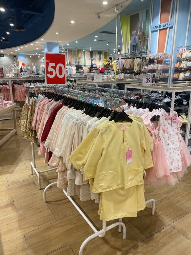 Baby dresses and two-piece outfits priced at RM29, RM39, RM49, and RM50