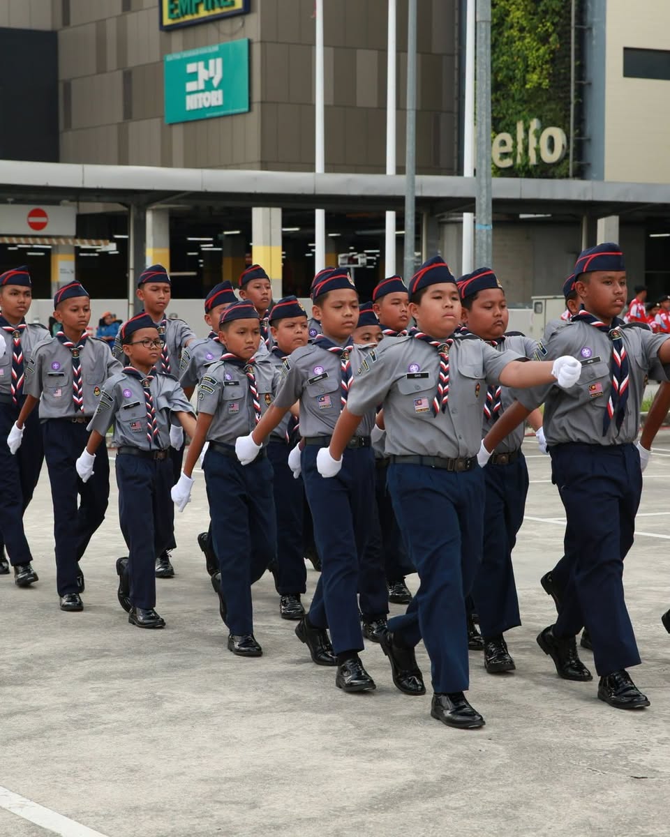 Uniformed contingent marching in formation