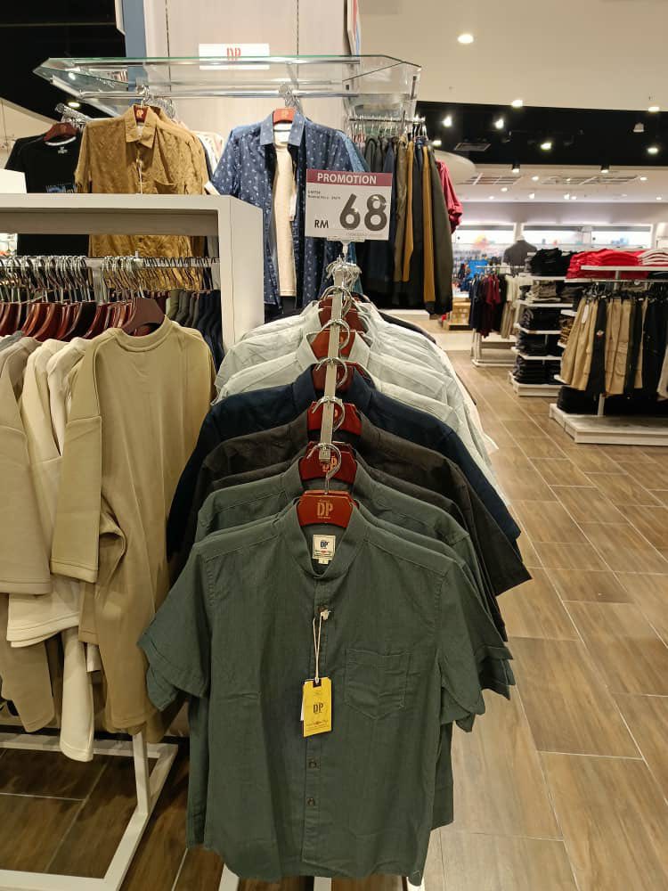 Shoppers browsing in the men's department