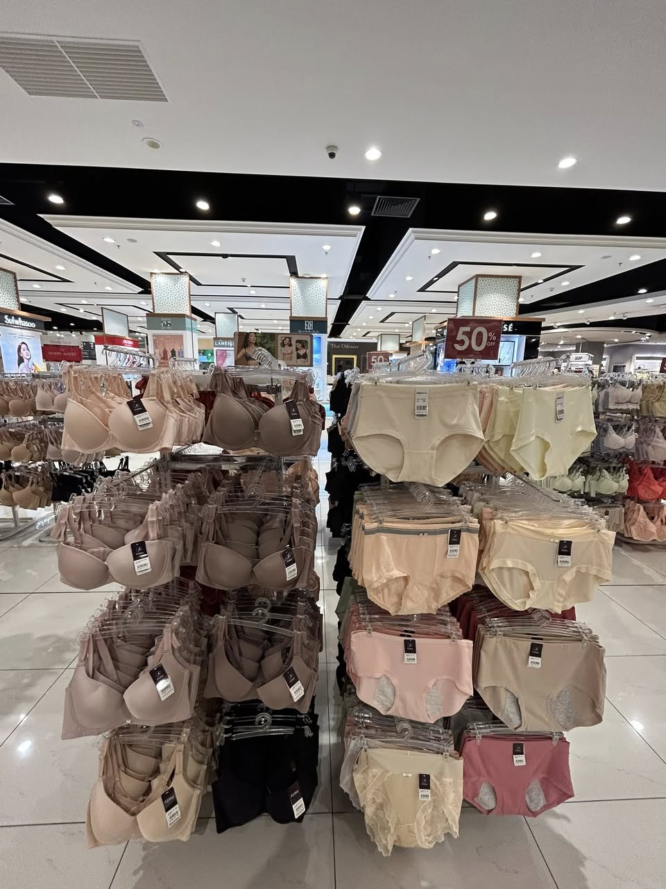 Interior view of the Audrey store, showcasing organized product sections.