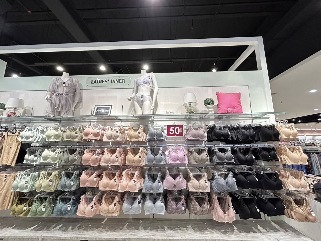 Audrey promotional display featuring a wide range of innerwear items.