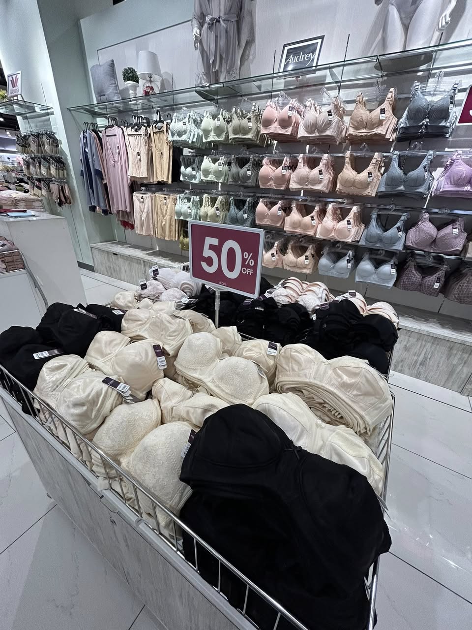 Diverse collection of innerwear styles and colors, neatly arranged on display.