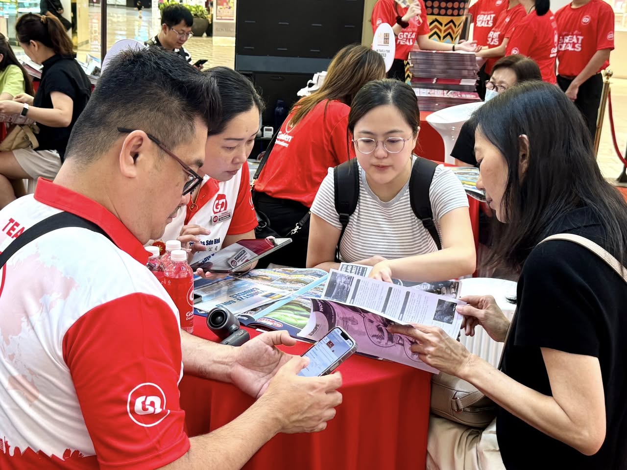 Excited visitors at the GD Travel Fair