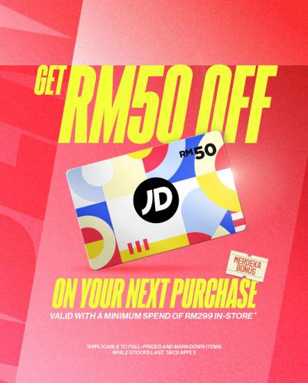 Shoppers enjoying a Merdeka promotion with gift vouchers
