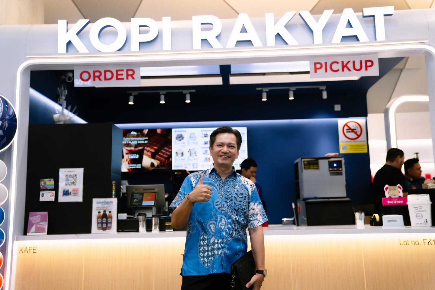 Ribbon-cutting ceremony at Kopi Rakyat's new branch