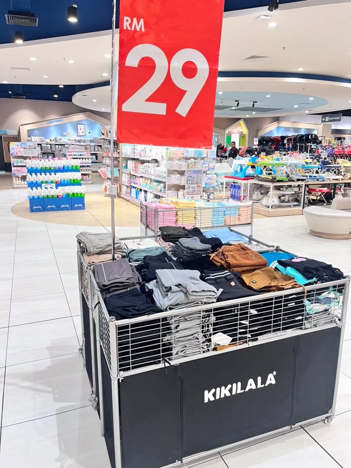 Kikilala display with children's clothing at TQ Day