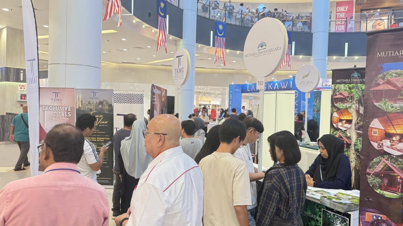 A lively scene showcasing activities and crowds at the MAH Tourism Fair