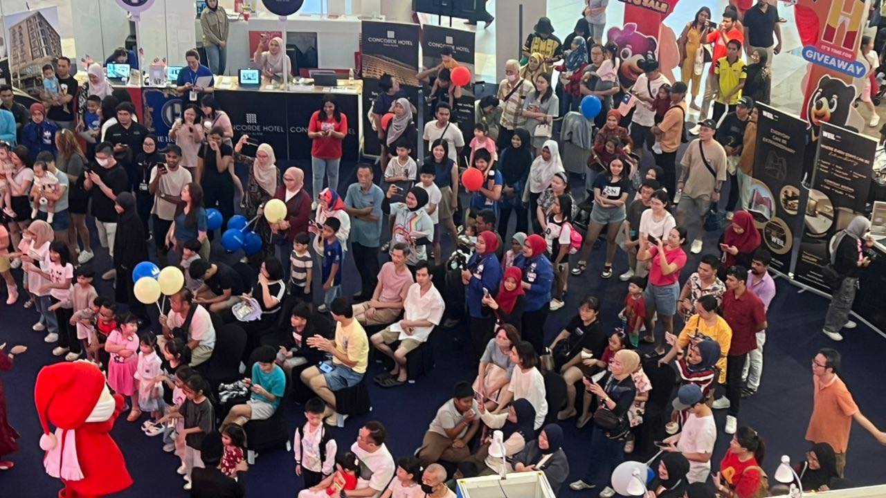 Vibrant crowd enjoying the MAH Tourism Fair in Johor Bahru