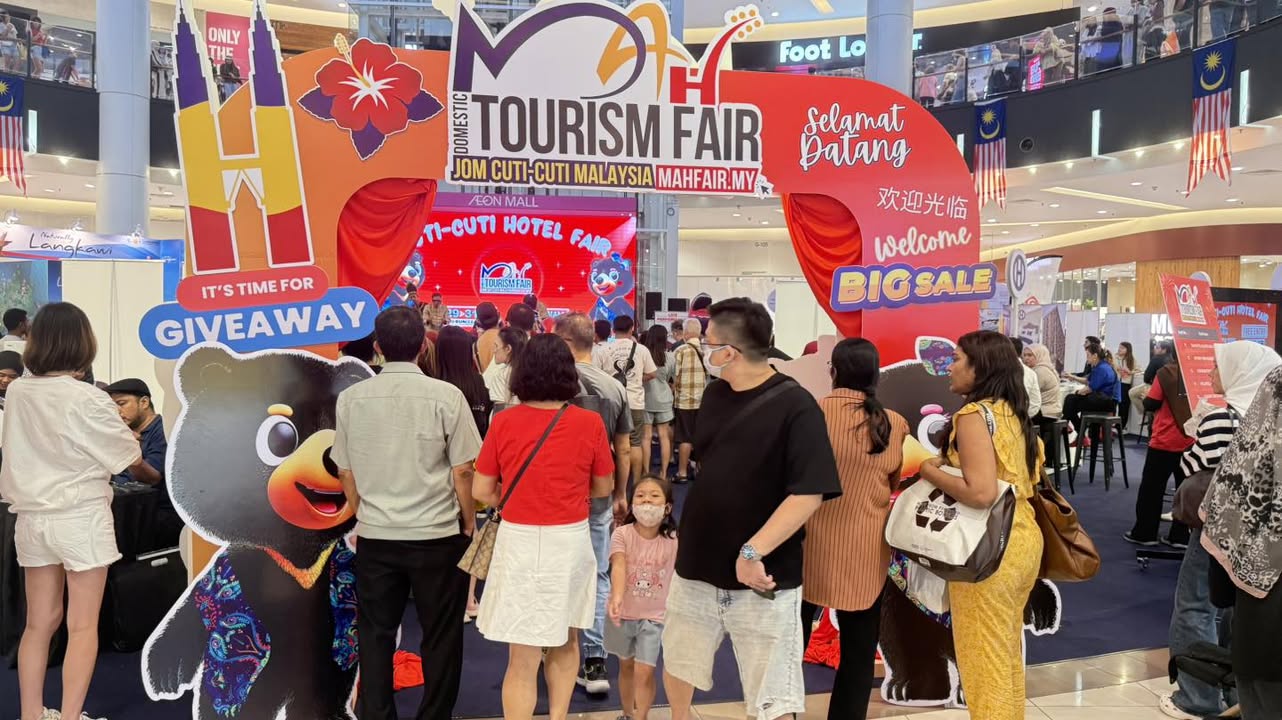 Engaged exhibitors and visitors at the bustling MAH Tourism Fair