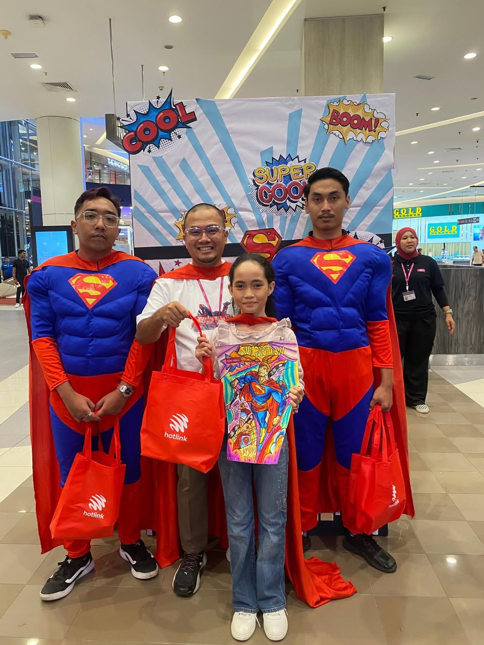 Brightly coloured Superman drawings, showcasing the children's creativity.