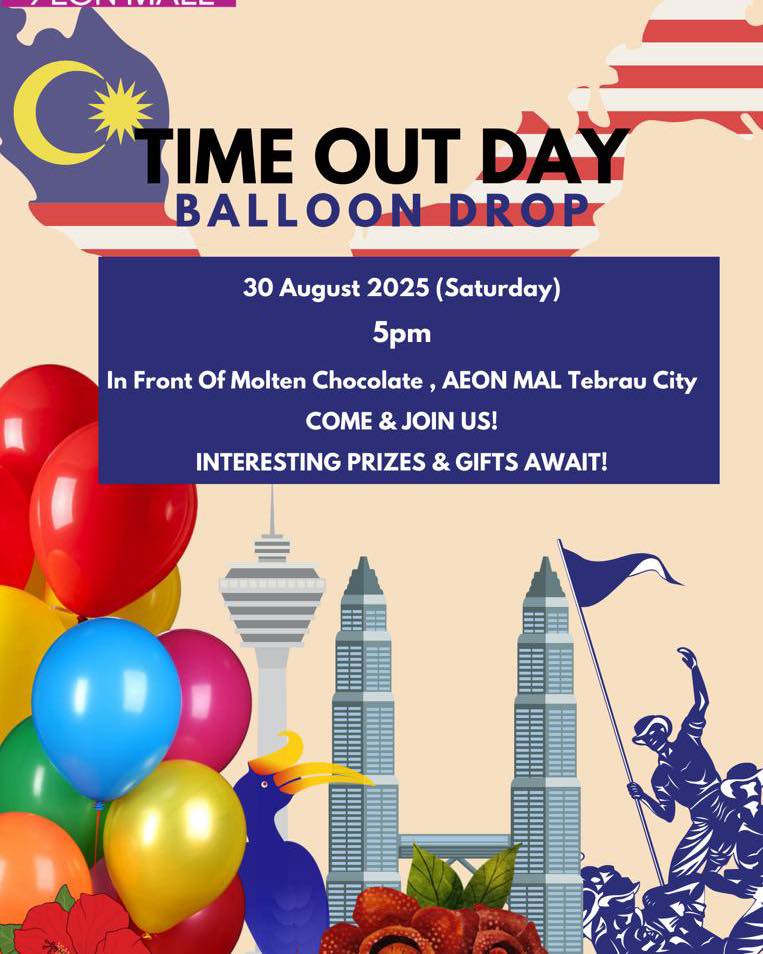 A festive balloon drop event with colorful balloons descending and an excited crowd gathered.