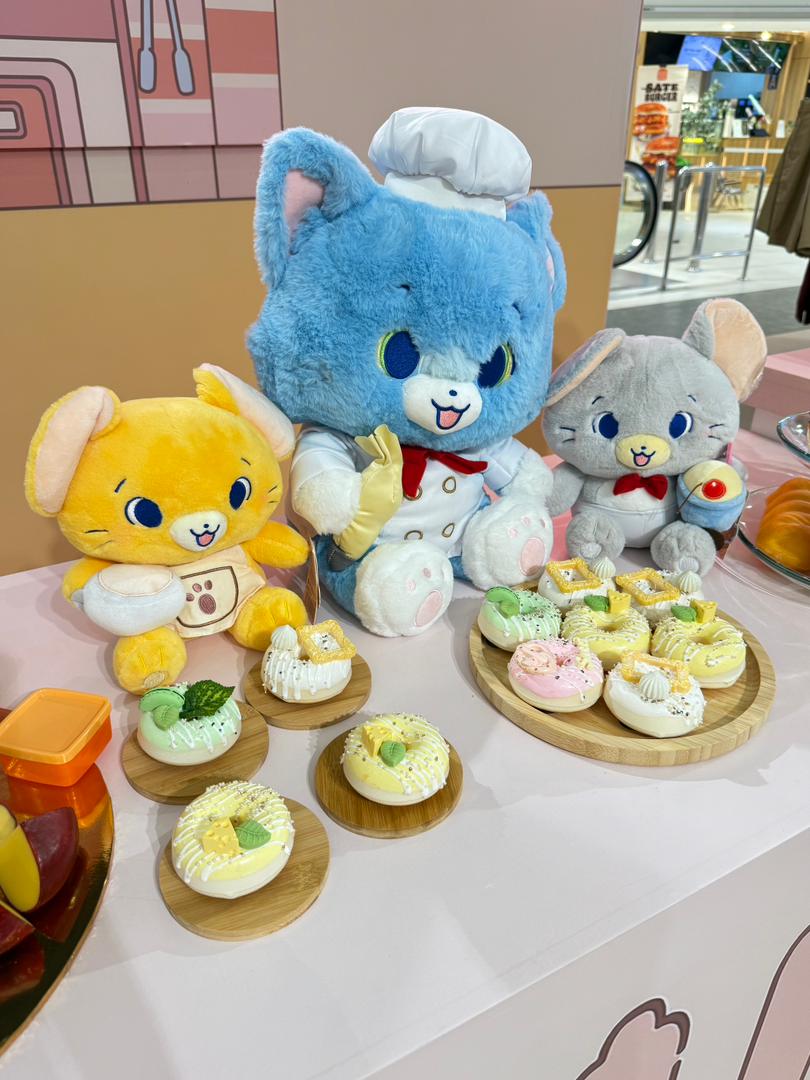 Close-up view of intricately designed Tom & Jerry Gokko exclusive items, highlighting their unique artistry.